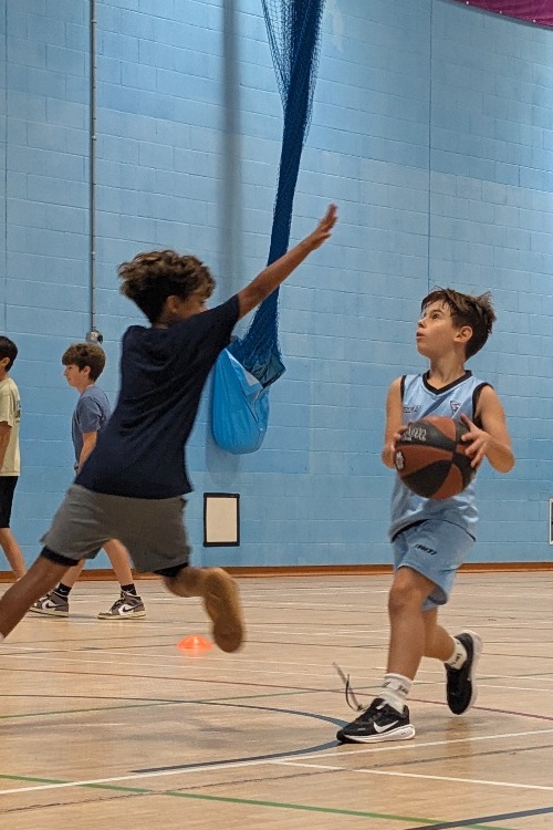 Young Bulls players training on court